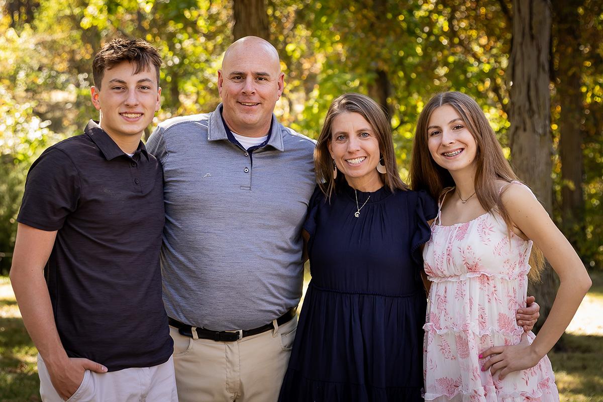 Ted with his wife, Kate, and their children, Claire and Ben. (Place family photo)